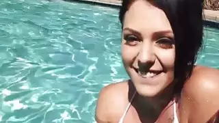 Sexy chicks share a cock on a pool party sucking and fucking
