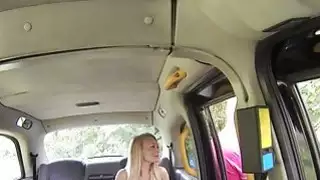 Dirty blonde sucks dick after pissing in fake taxi