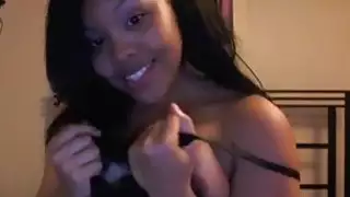 Slutty dark teen masturbates cunt at home