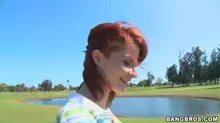 Golfing redhead MILF in action