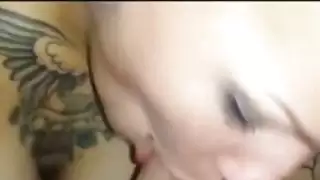 Inked Busty Babe Cocksucking